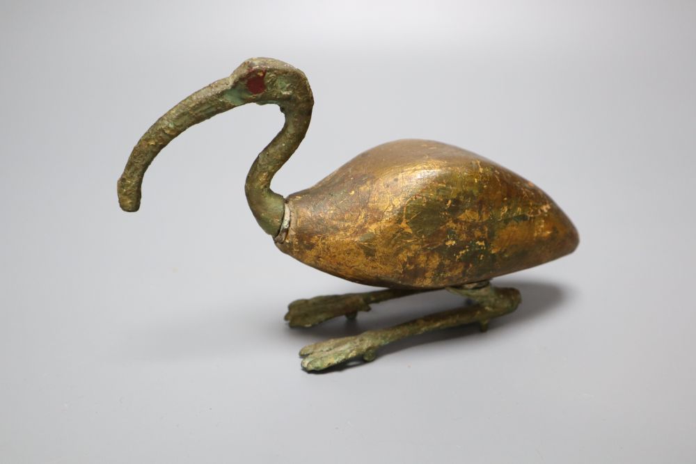 A bronze and wood model of an Ibis, L 18cm
